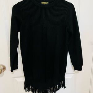 Long sleeve black sweater.